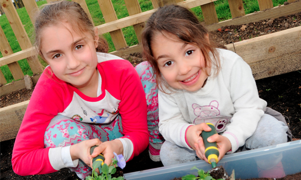 Green fingers: some young gardeners pitched in to help this year's Islington in Bloom competition to flower, at the launch event. Photographs: Islington Council