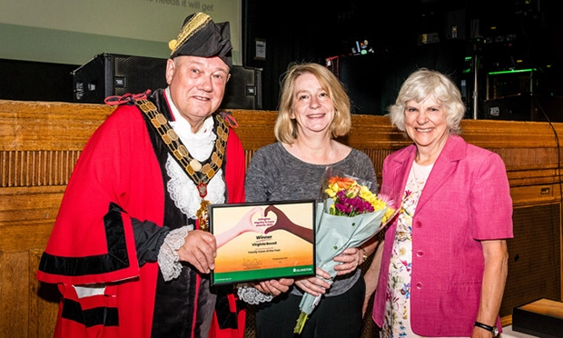 Carer Virginia Bovell is presented with her award by Mayor of Islington Gary Heather and Cllr Janet Burgess