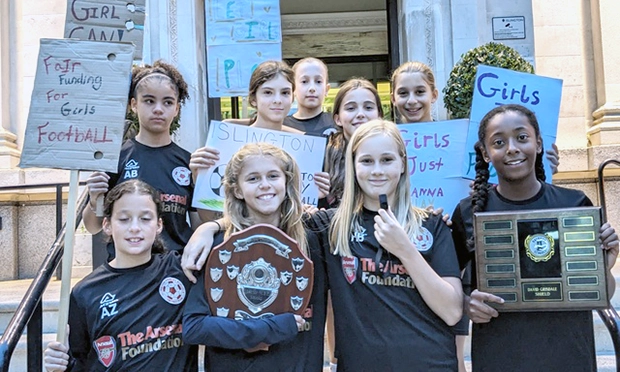 Footballers from Islington District Girls Team ask for support to fund their team.